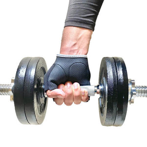 Close up of a hand with a fitness glove on holding a dumbbell