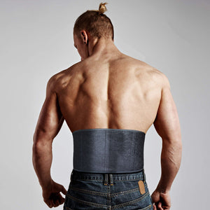 Male athlete wearing a back support belt