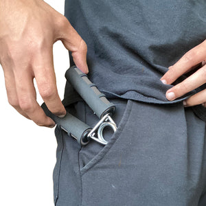 Hand grip strenghthener being stored in pant pocket