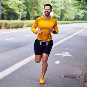 Male athlete on a run with a fitness waist pack on