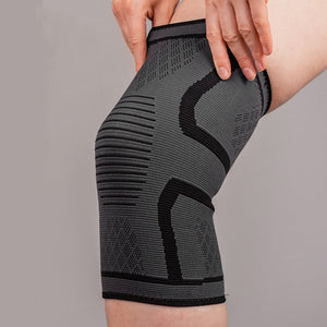 Person putting on a woven knee brace
