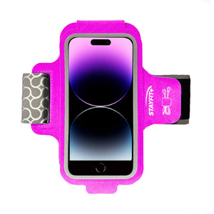 Pink phone armband case holding an iphone 14