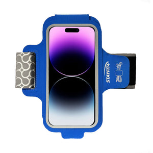 Blue phone armband case holding an iphone 14